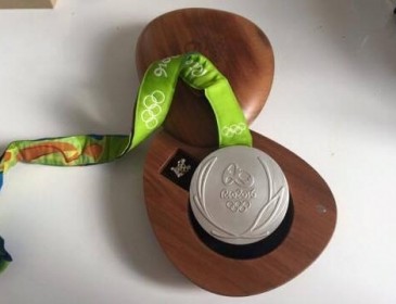 Олімпійська медаль допоможе дитині